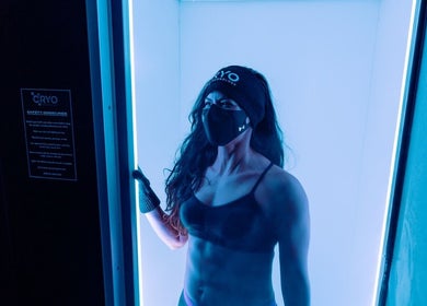 Person enjoying cryotherapy at Chill Wellness, Auckland, Auckland, NZ in a high-tech chamber.