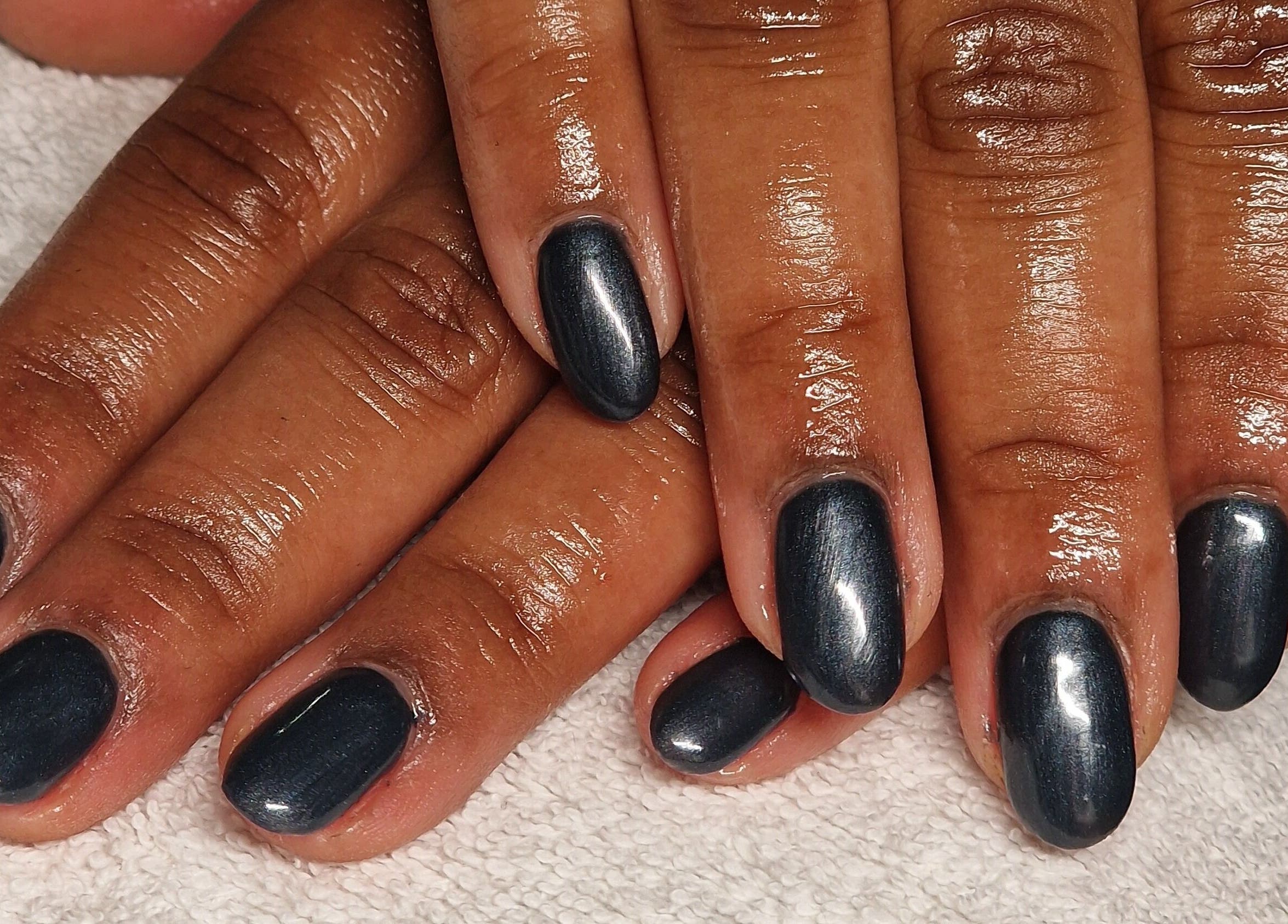 Stylish black manicure at Perfectly Polished with Kirsty, Northampton, England, GB.