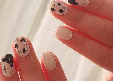 Stylish black and white nail art at The Rainbow Studio, Southampton, GB offering elegant manicures.