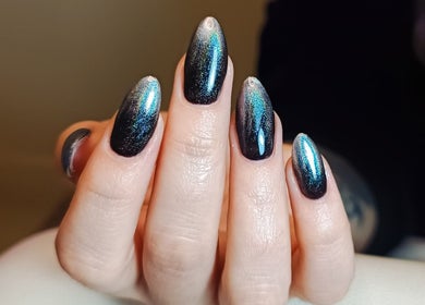 Elegant multicolored manicure from The Rainbow Studio in Southampton, GB showcasing glossy ombre finish.