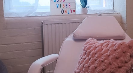 Relax in the comforting lounge chair at The Rainbow Studio, Southampton, GB, surrounded by positive vibes decor.