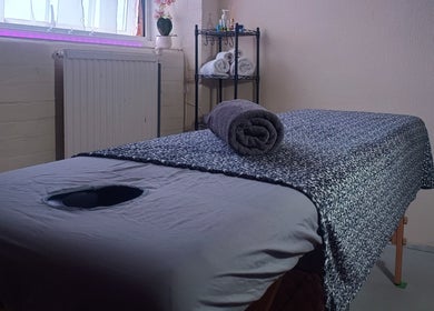 Relaxing massage table at The Rainbow Studio, Southampton, GB, ready for treatments.