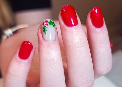 Red and festive nail art at The Rainbow Studio, Southampton, GB.