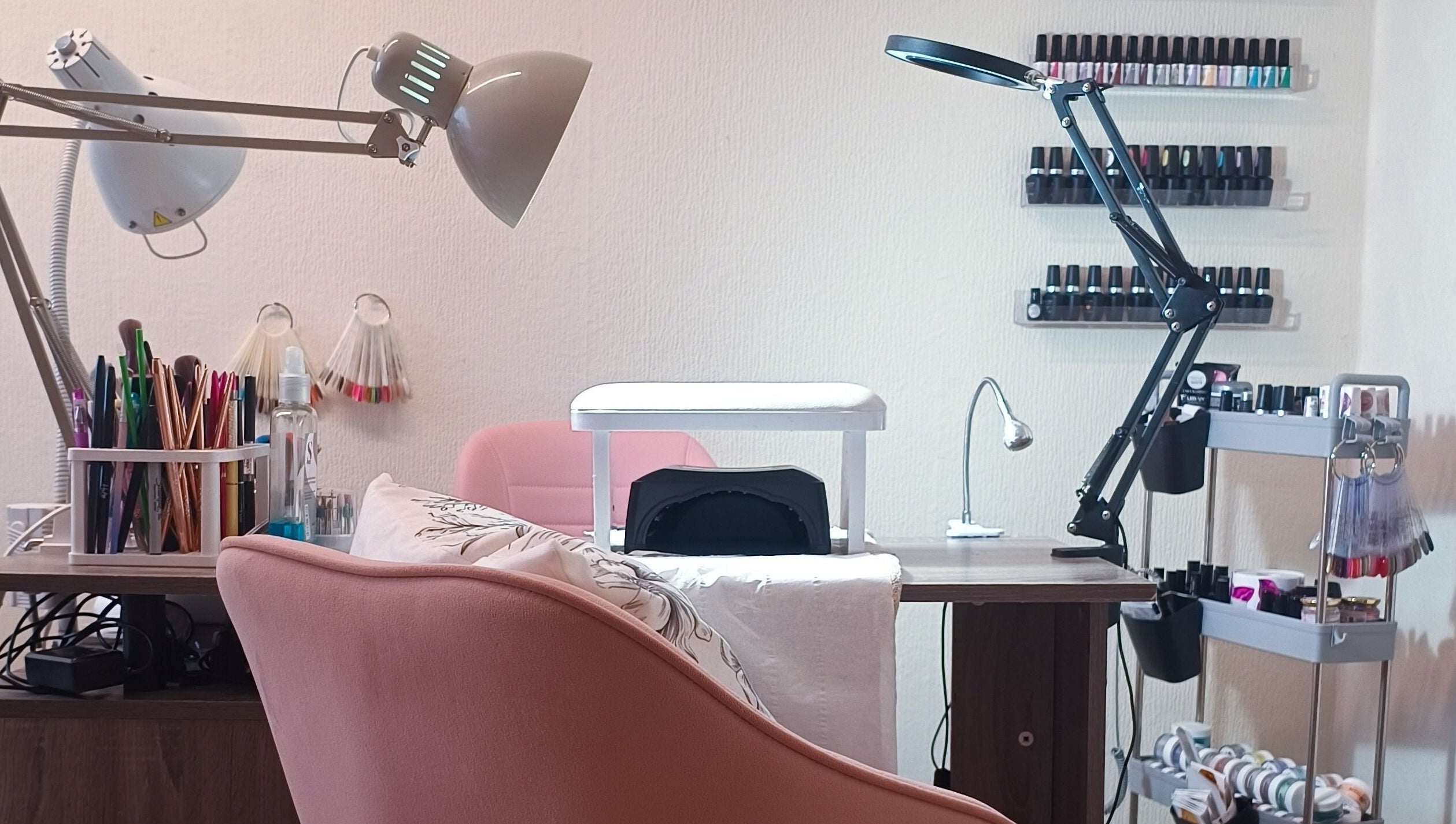 Chic nail station at The Rainbow Studio, Southampton, GB showcasing stylish decor and manicure tools.
