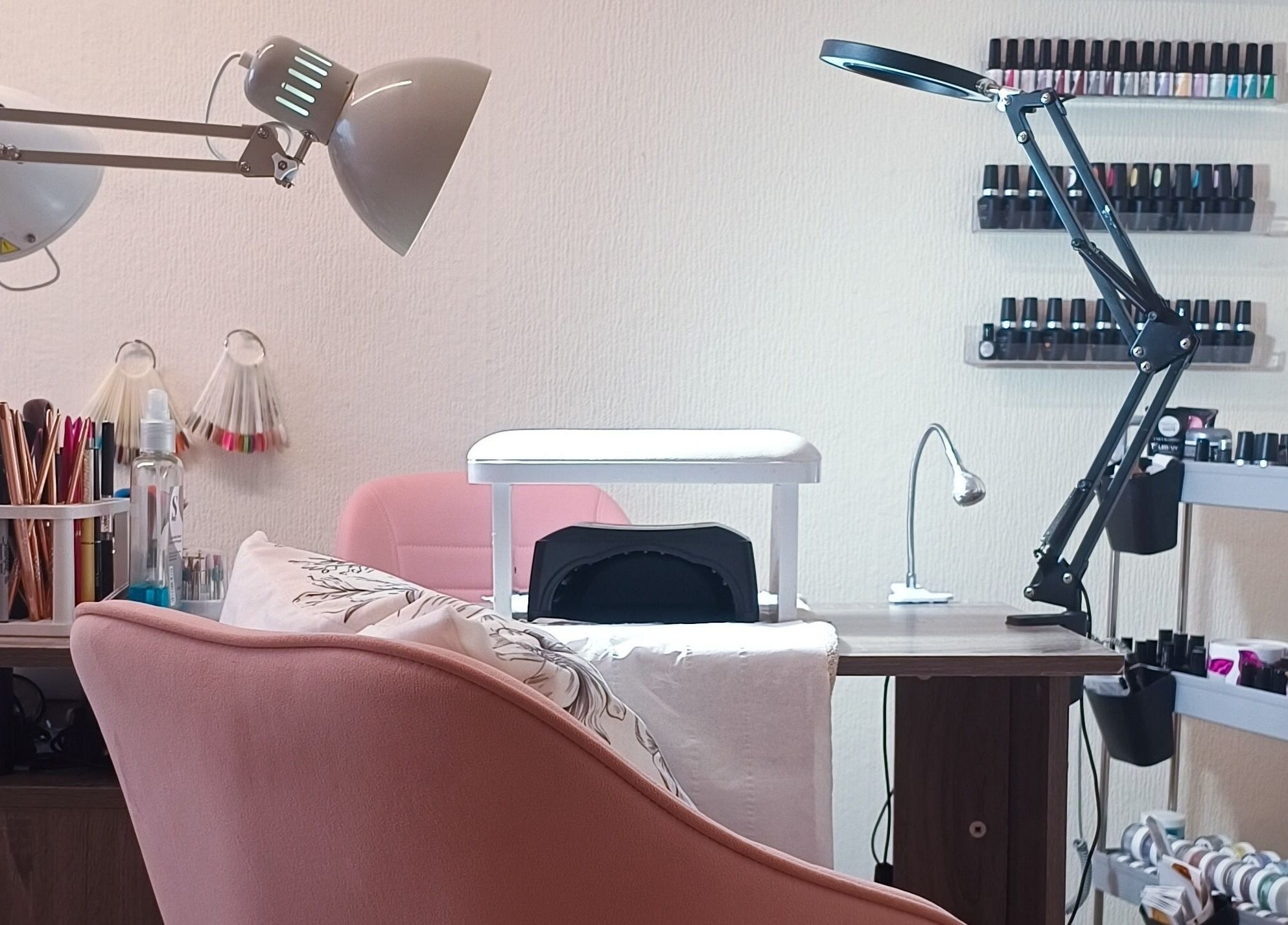 Chic nail station at The Rainbow Studio, Southampton, GB showcasing stylish decor and manicure tools.