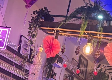 Stylish interior at Danie Beauty, Hillsborough, England, GB featuring vibrant decor and calming plants.