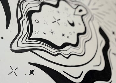 Abstract black and white cosmic design adorning the walls at Danie Beauty, Hillsborough, England, GB.
