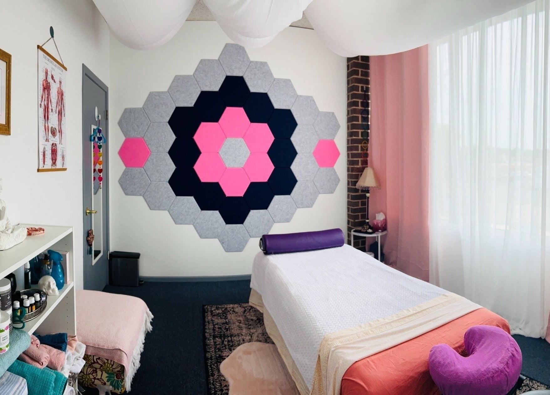 Calm therapy room at Mindful Body Studio, Hickory Hills, Illinois, US featuring a serene decor and massage table.