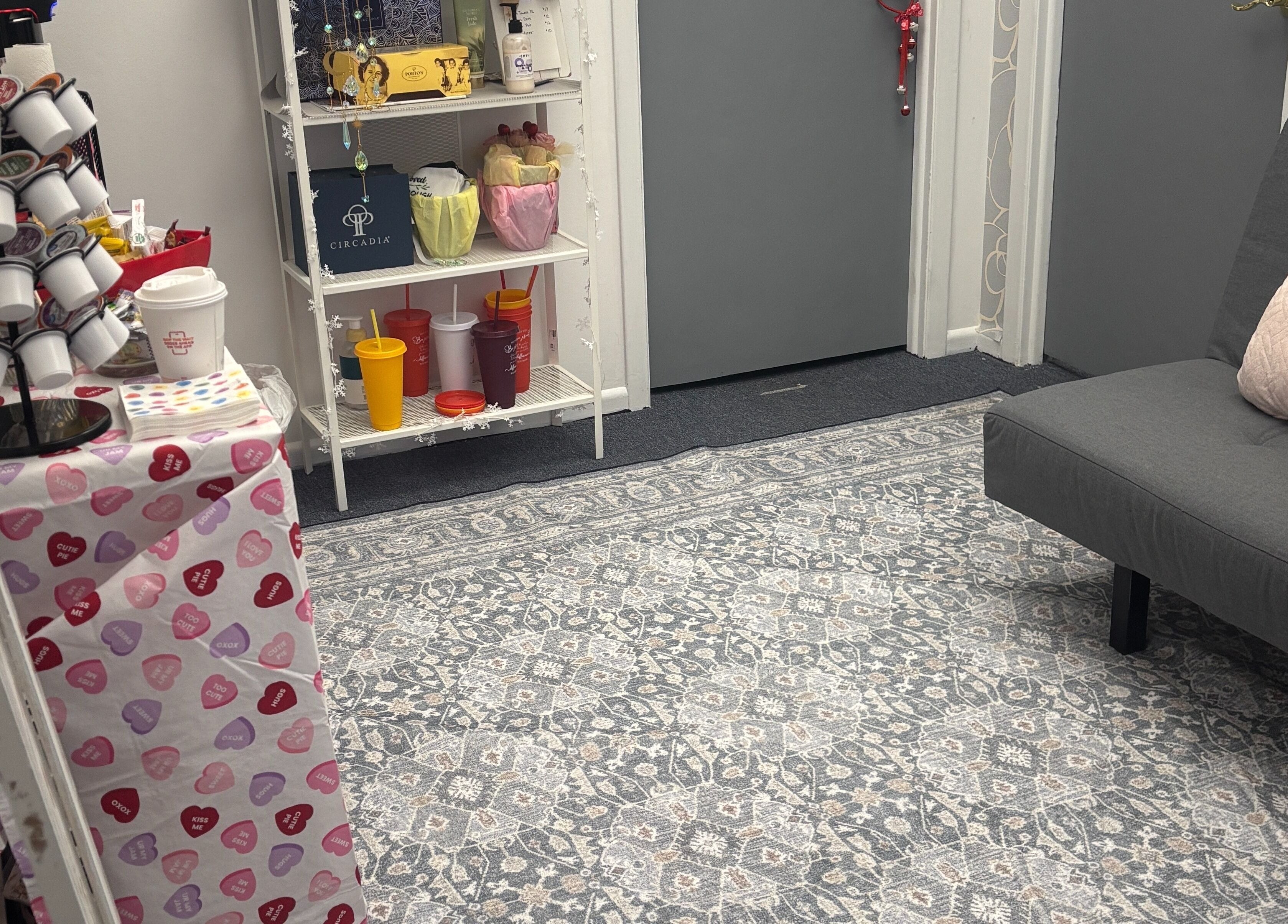 Inviting relaxation area at Mindful Body Studio, Hickory Hills, Illinois, US, featuring soft seating and decor.