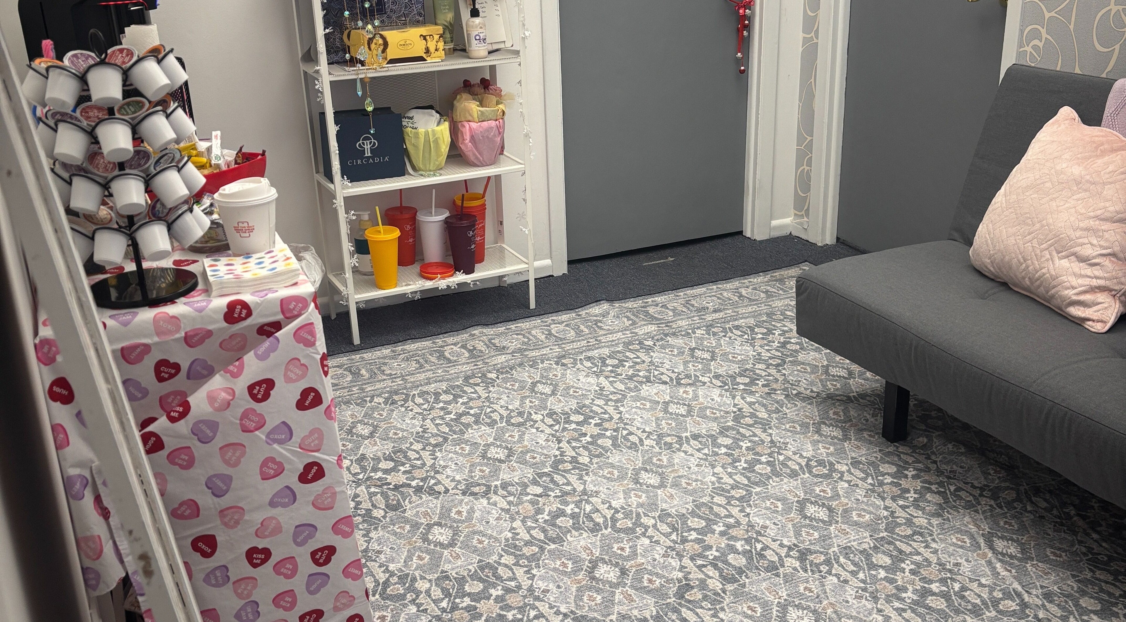 Inviting relaxation area at Mindful Body Studio, Hickory Hills, Illinois, US, featuring soft seating and decor.