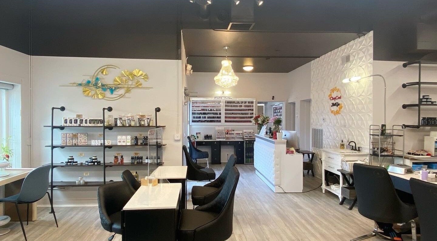 Cherry Creek Nail Spa interior in Denver, Colorado, US, featuring elegant nail stations and products.