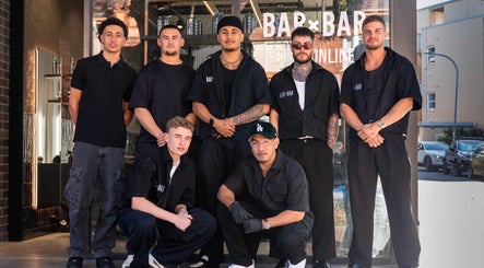 Team posing at BAR x BAR Bondi, Bondi Beach, New South Wales, AU showcasing style and unity.