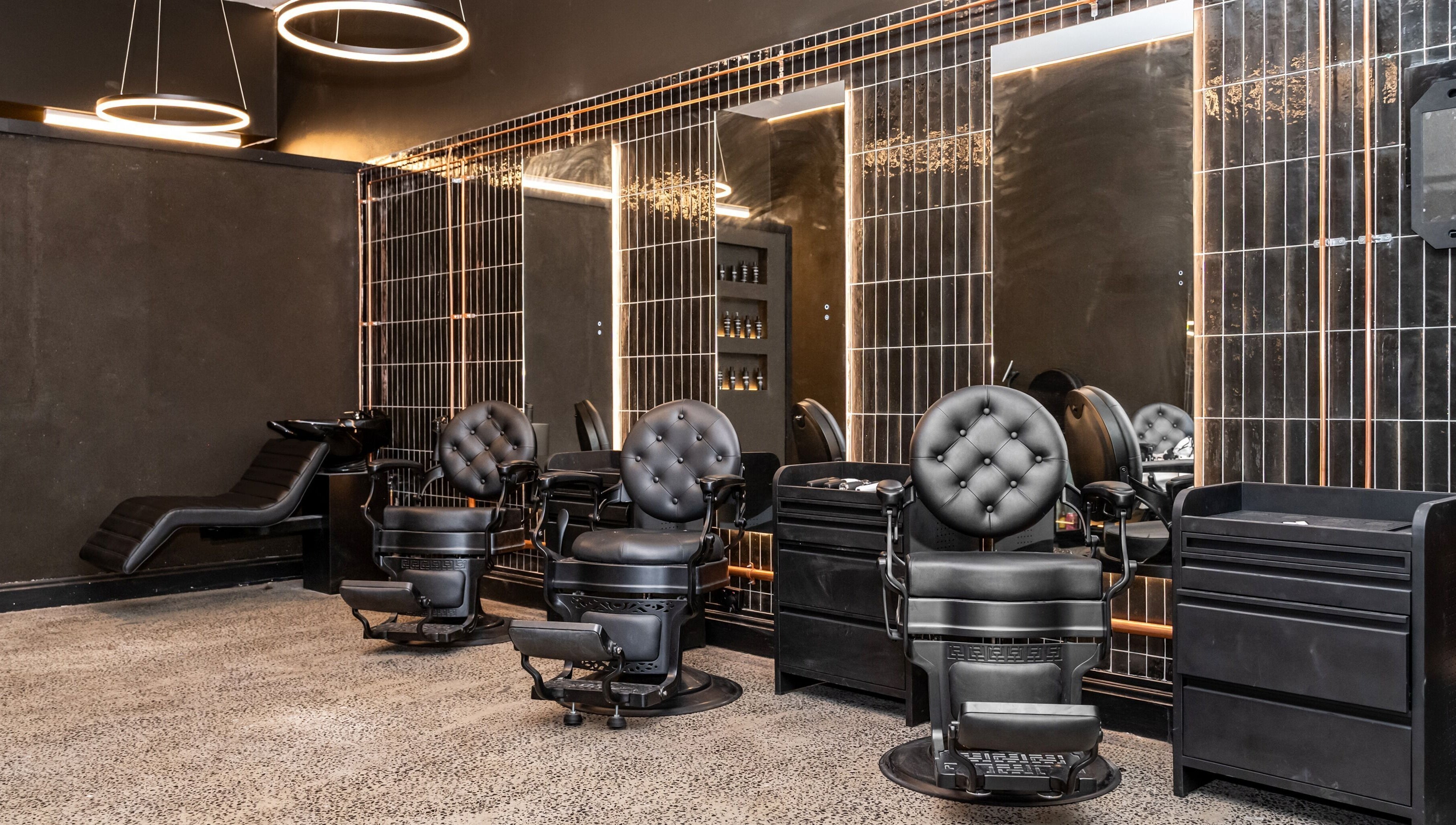 Luxurious barber chairs at BAR X BAR Freshwater, Freshwater, New South Wales, AU offer modern elegance.