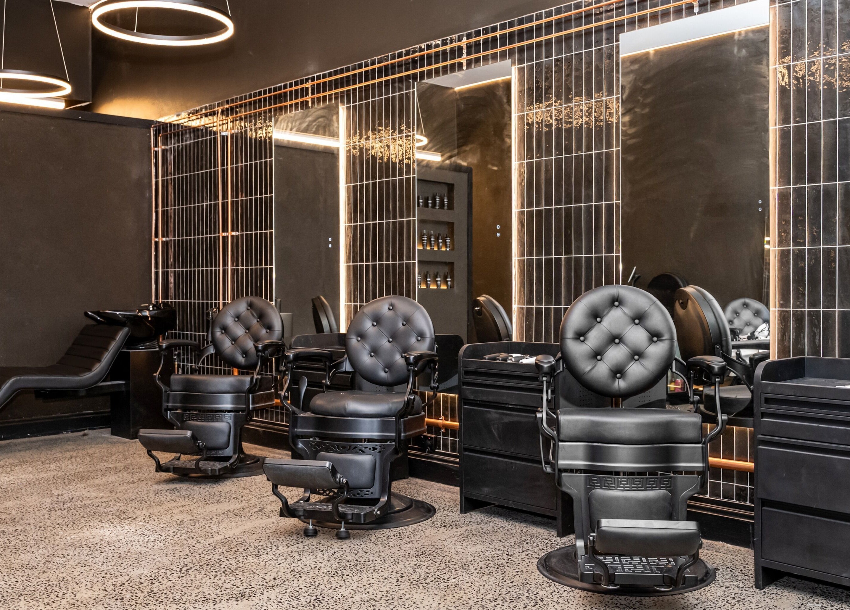 Luxurious barber chairs at BAR X BAR Freshwater, Freshwater, New South Wales, AU offer modern elegance.