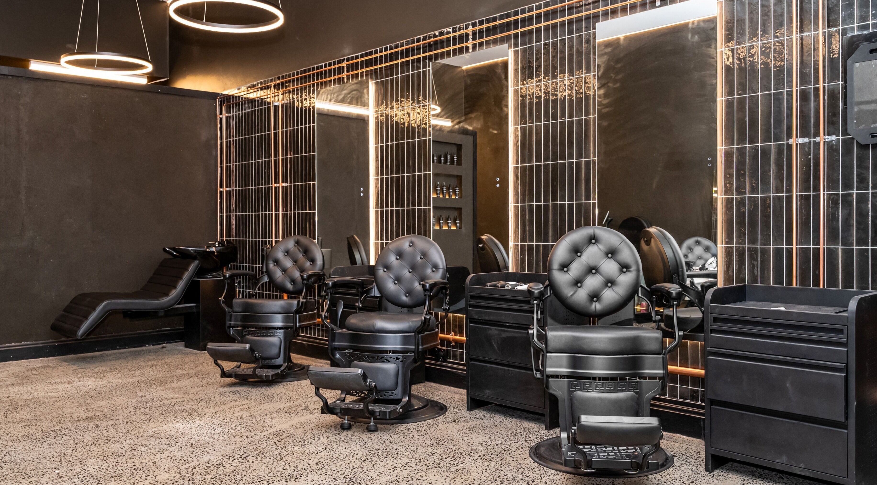 Luxurious barber chairs at BAR X BAR Freshwater, Freshwater, New South Wales, AU offer modern elegance.