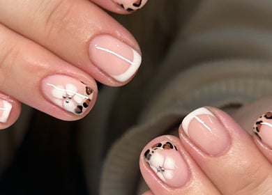 Elegant nail art with floral accents at Aleita’s Beauty, Kilmarnock, Scotland, GB.