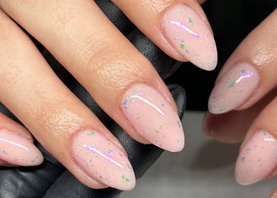 Sparkling pink nails at Aleita’s Beauty in Kilmarnock, Scotland, GB. Perfect for chic style and beauty care.