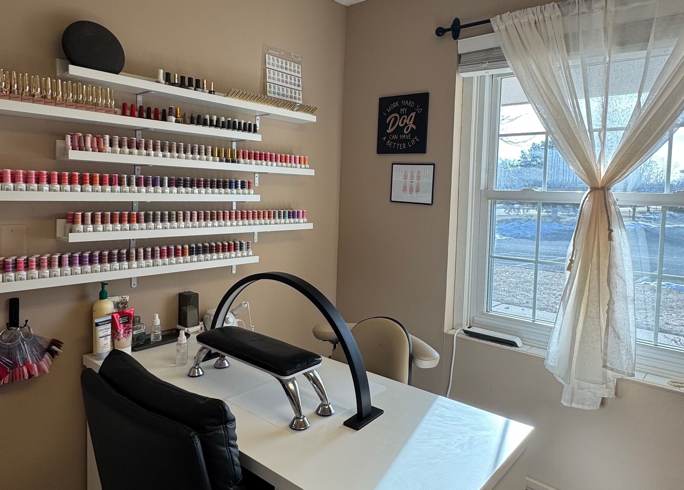 AB Beauty Studio's inviting nail station with colorful polish in Wayzata, Minnesota, US.