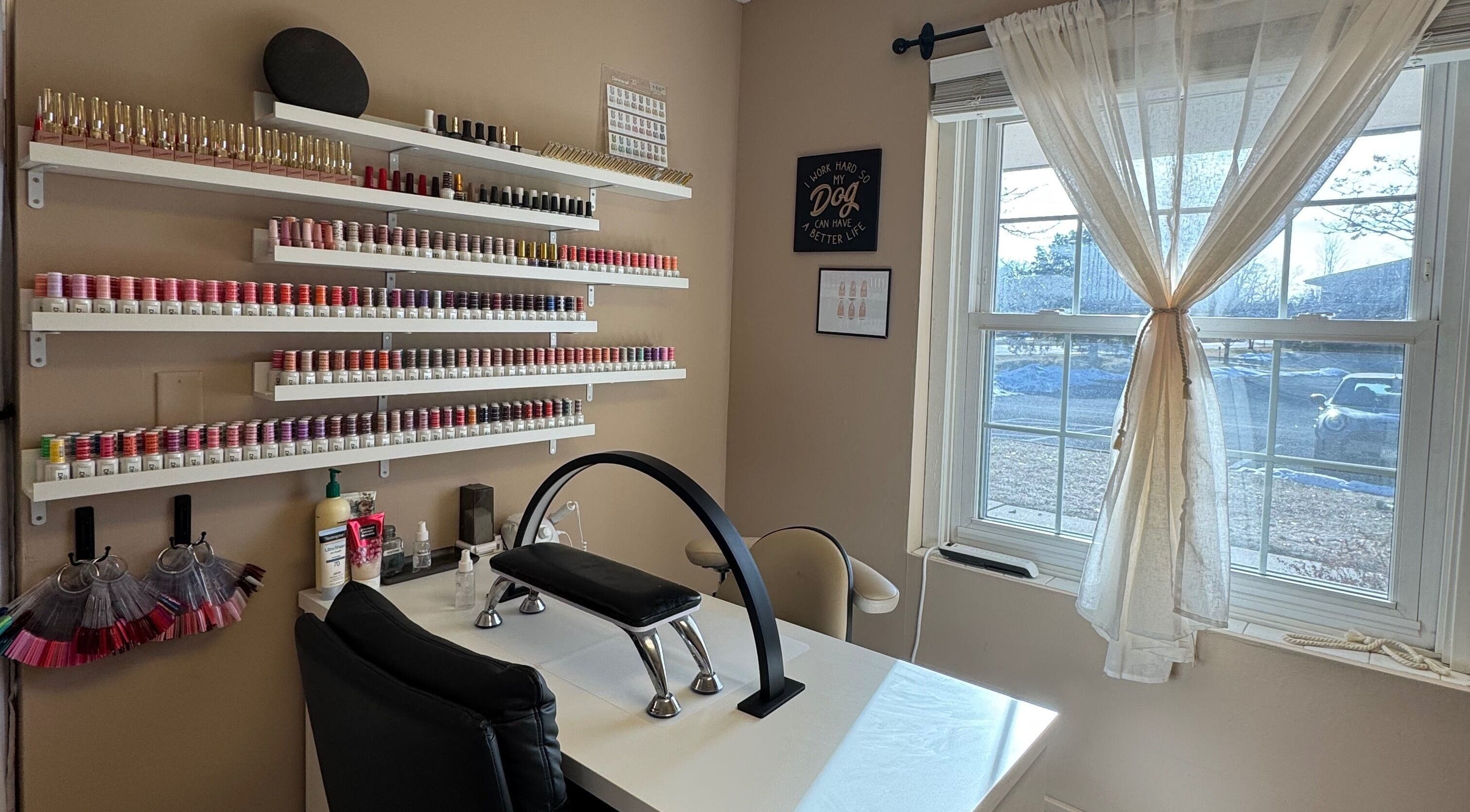 AB Beauty Studio's inviting nail station with colorful polish in Wayzata, Minnesota, US.