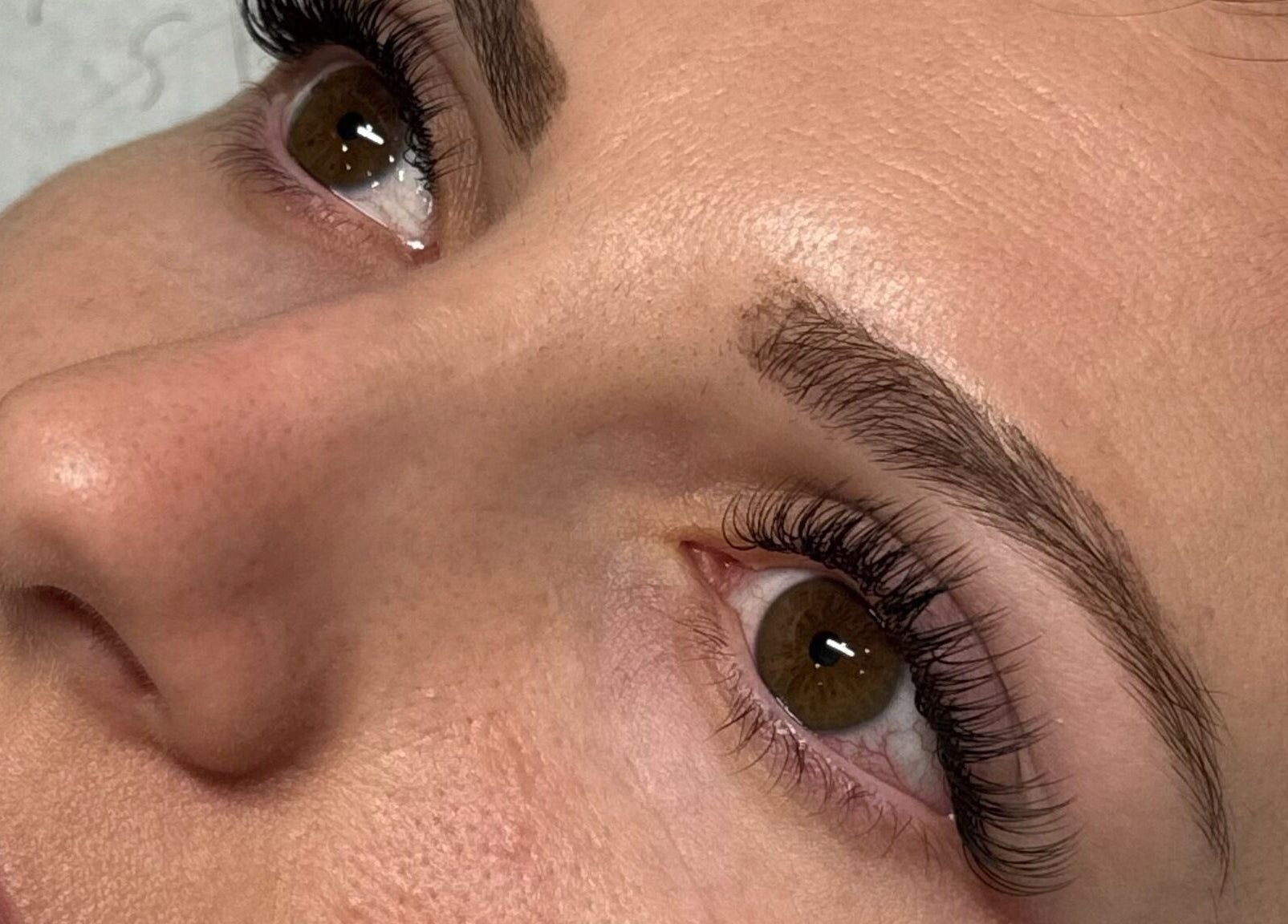 Close-up of eyelash extensions at Beautique Hair and Beauty Bar, Haywards Heath, GB. Showcasing detailed lash work.