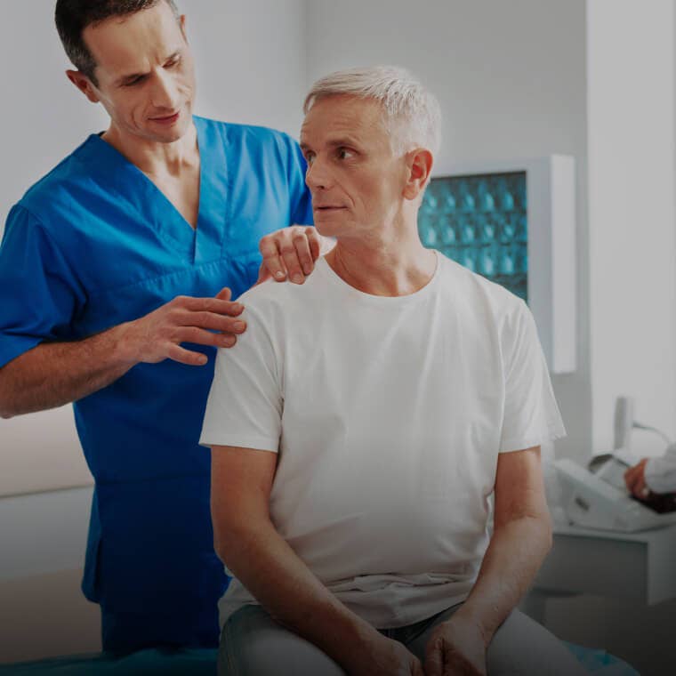 Healthcare professional consulting with a patient in a clinic setting, representing health practice services on Fresha.
