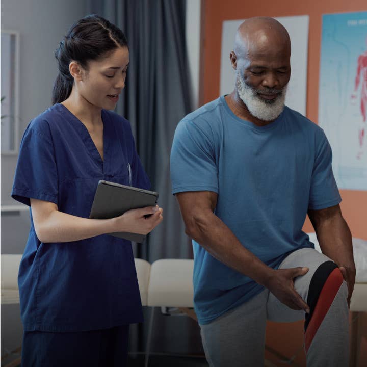 Physical therapist assisting a patient with exercises in a rehabilitation center, highlighting physical therapy services on Fresha.