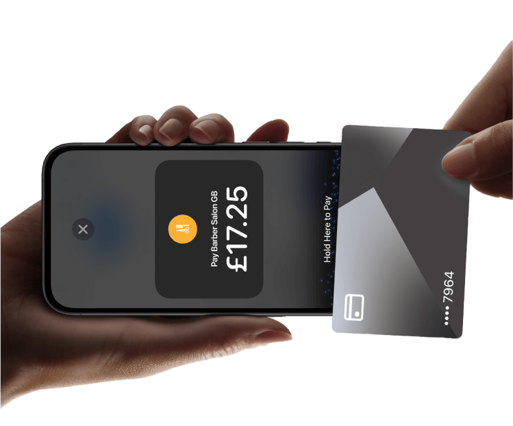 Client making a contactless payment via smartphone using Fresha Payments at a salon powered by Fresha Business.