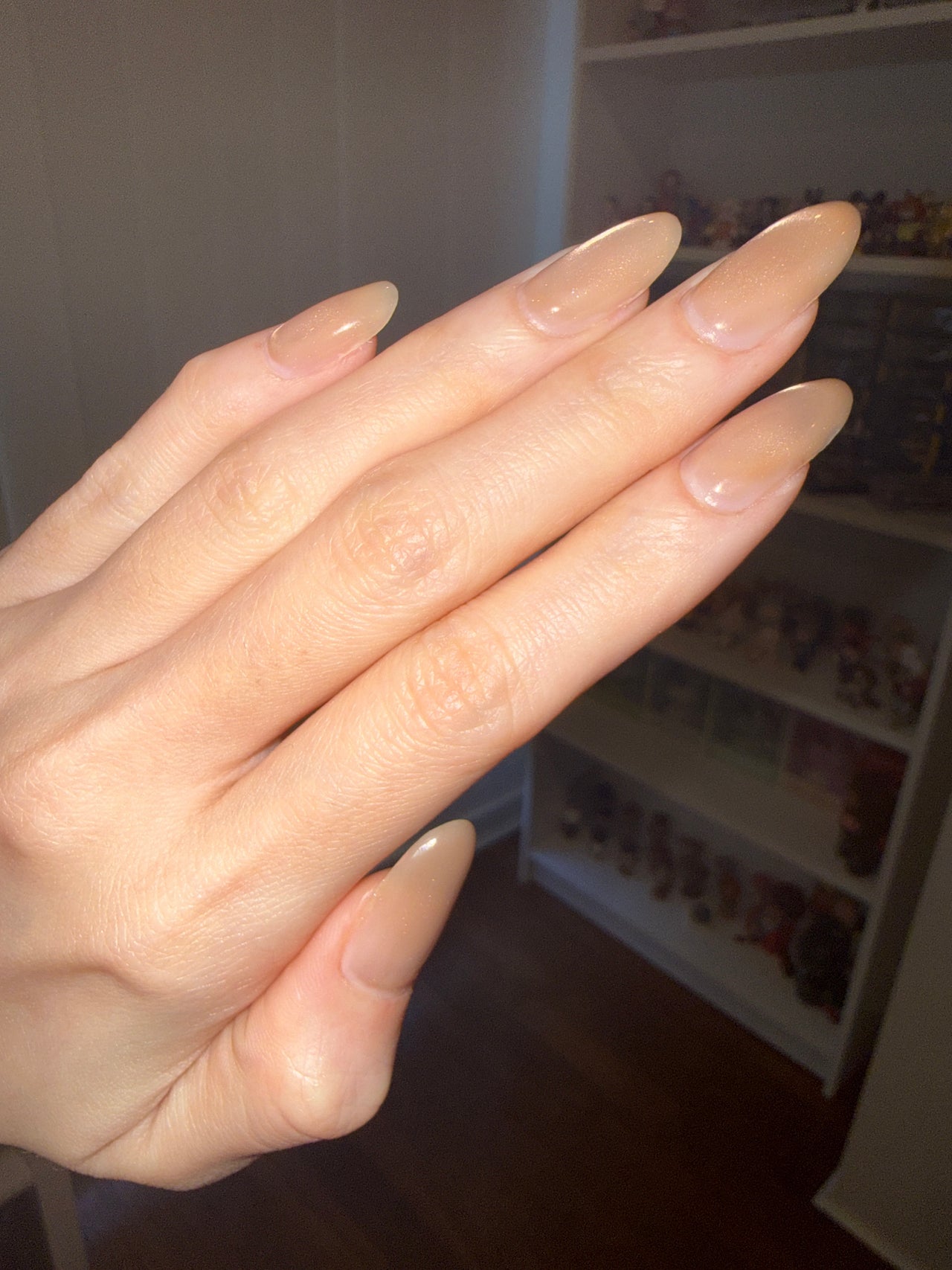 Elegant nude gel nails with a glossy finish, showcasing Atelier V Nail Studio's nail art in Como, Western Australia, AU.