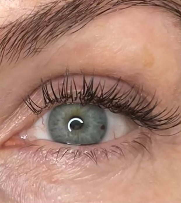 Close-up of a beautifully groomed eye with classic lash extensions from ecDOnails & lash in Temecula, California, US.