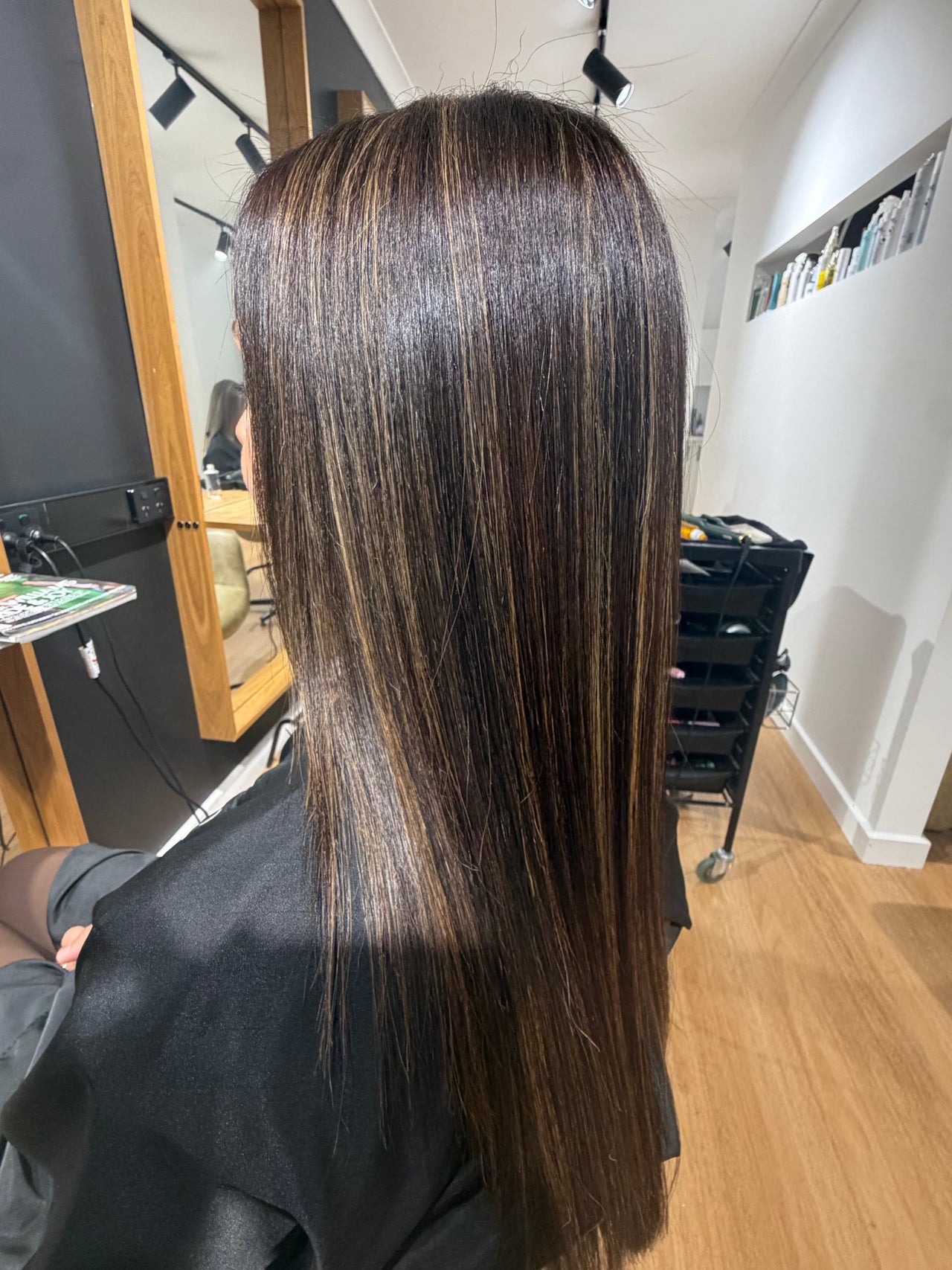 Smooth, sleek hair after a professional straightening treatment at Infinity Hair Co in Nelson Bay, New South Wales, AU