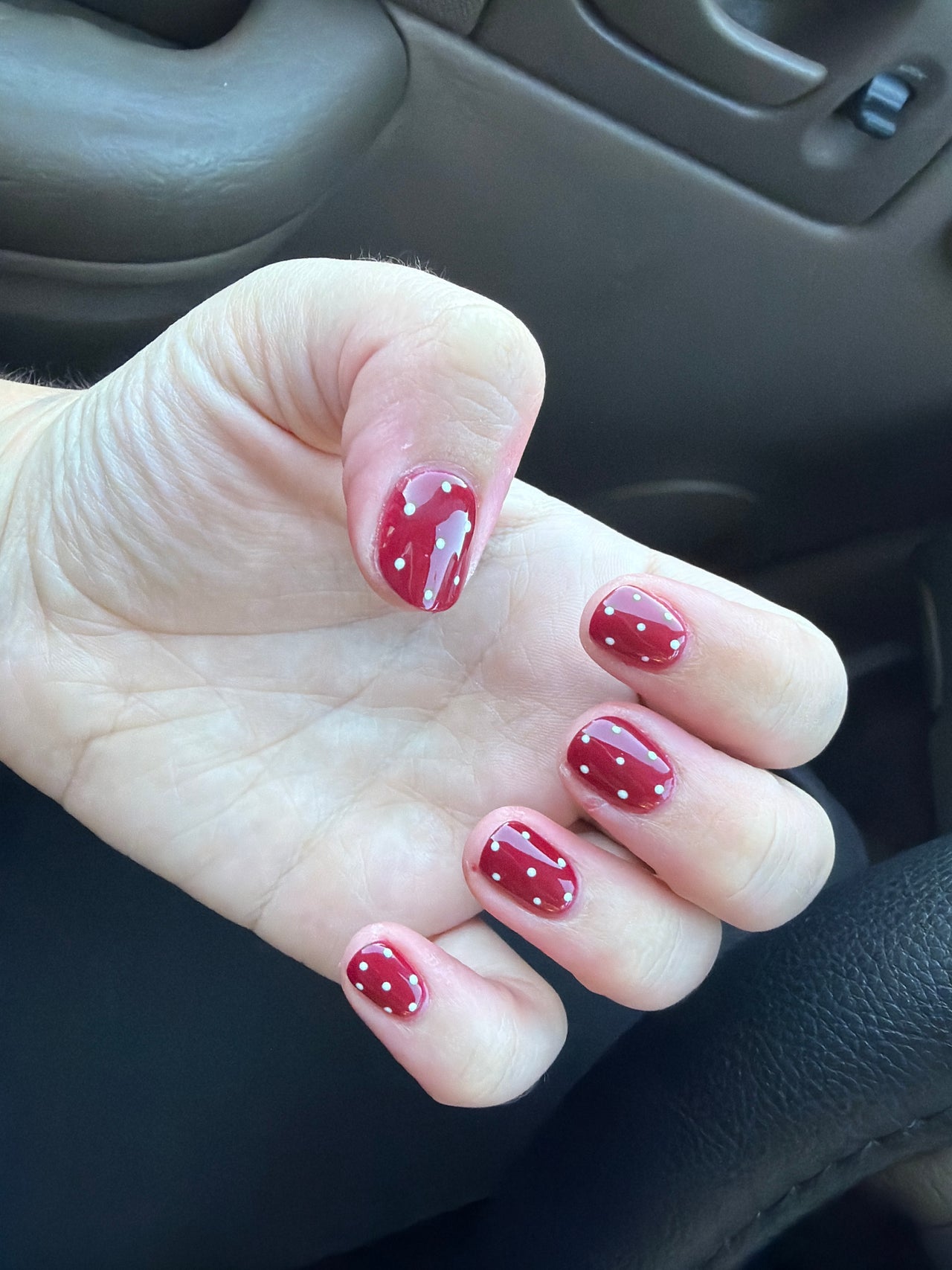 Catherine Nails' red and white polka dot nail art in Kalamazoo, Michigan, US